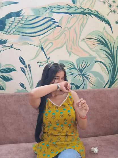 Barnora Tina Collection Mustard Yellow Sleeveless Cotton Short Kurta for Women with Blue Floral Prints – Trendy Ethnic & Casual Wear