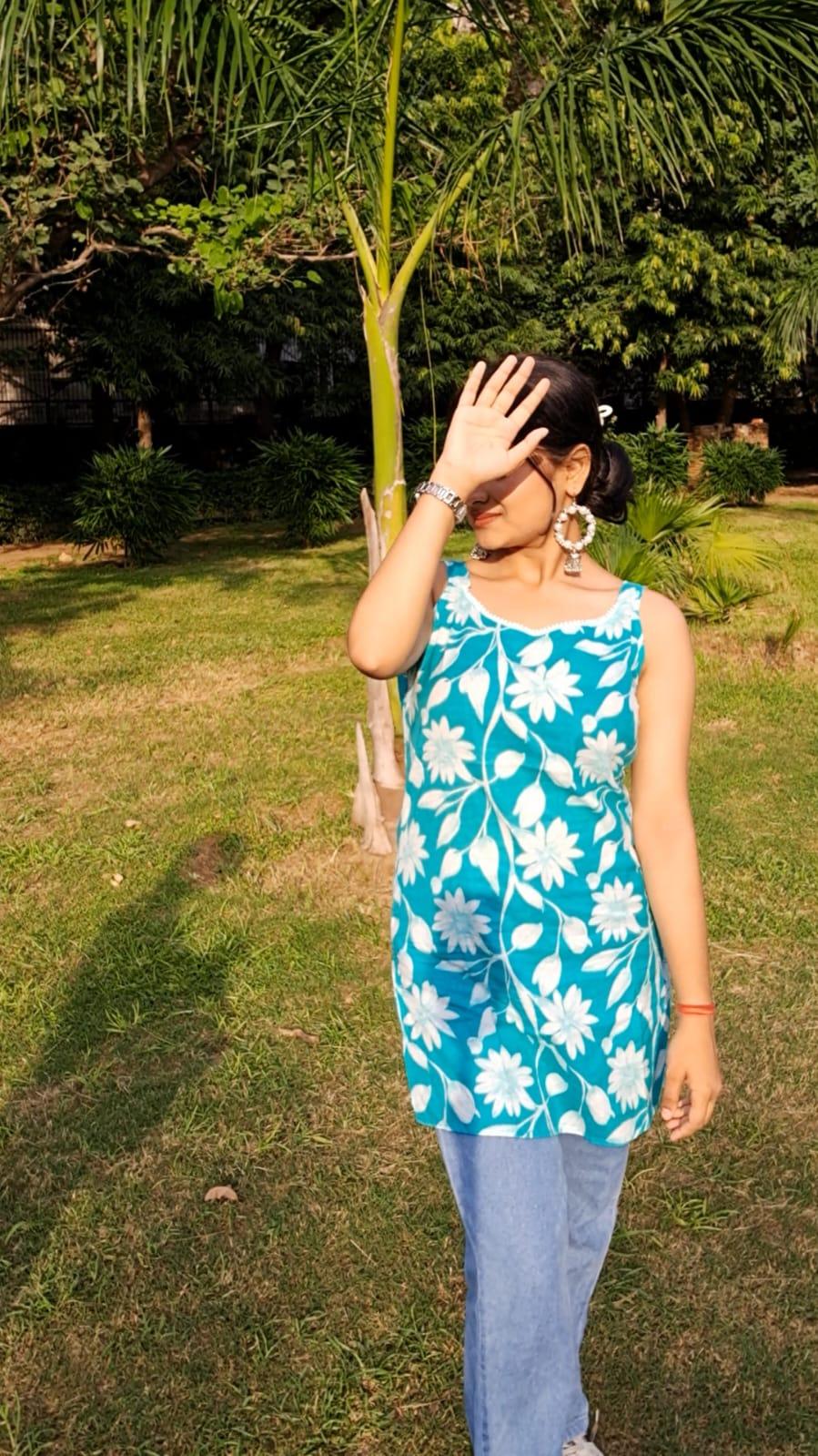 Barnora Tina – Sky Blue Sleeveless Floral Printed Cotton Short Kurta | Summer Casual Kurti for Women